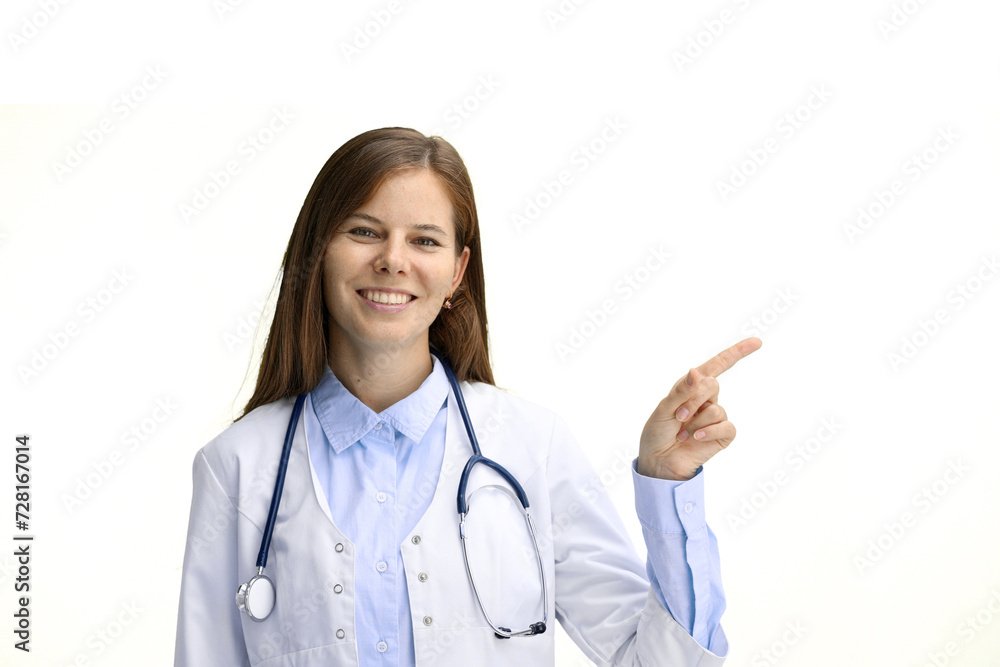 Female doctor, close-up, on a white background, pointing to the side