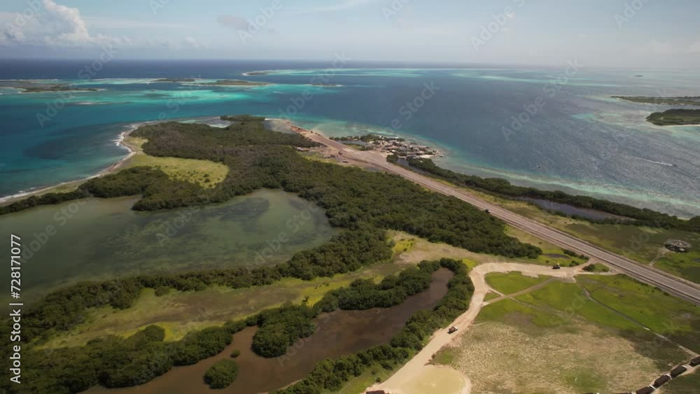 Los roques archipelago showing the contrast of lush greenery and turquoise waters, aerial view Los roques archipelago showing the contrast of lush greenery and turquoise waters, aerial view