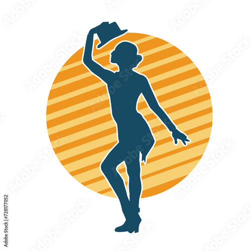 Silhouette of a female dancer in action pose. Silhouette of a woman dancing happily.