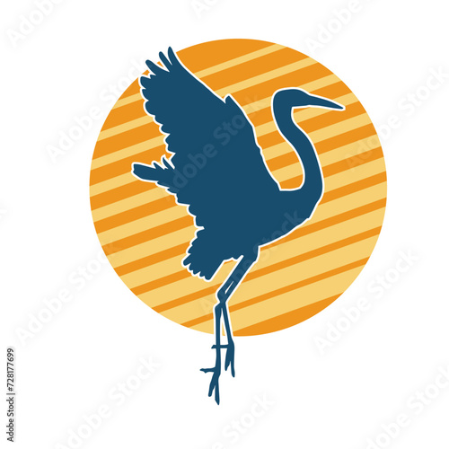 Silhouette of crane bird in elegant pose isolated on white background.
