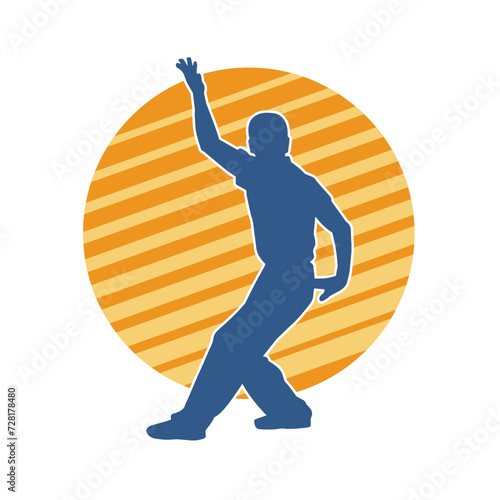Silhouette of a man in oriental martial art pose. Silhouette of a male in martial art move.