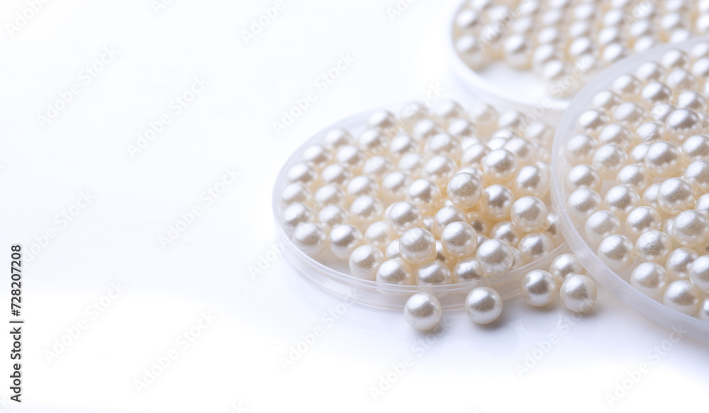 Pile of pearls on the white background Pile of pearls on the white background