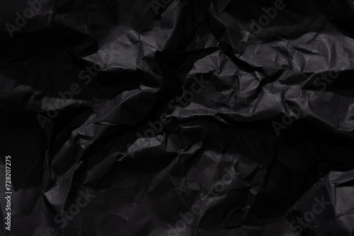 Crumpled and folded Black Paper Texture for background