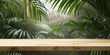Empty wooden table top on tropic palm leaves background. Table top with copy space for product advertising