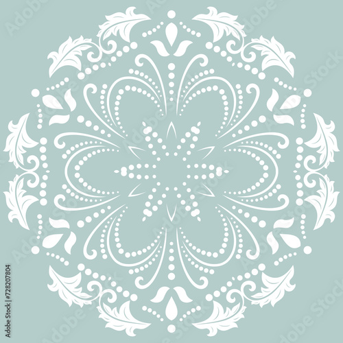 Oriental ornament with arabesques and floral elements. Traditional light blue and white round classic ornament. Vintage pattern with arabesques
