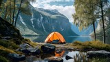 Tent Camping area by lake with mountains view, early morning, beautiful natural place.
