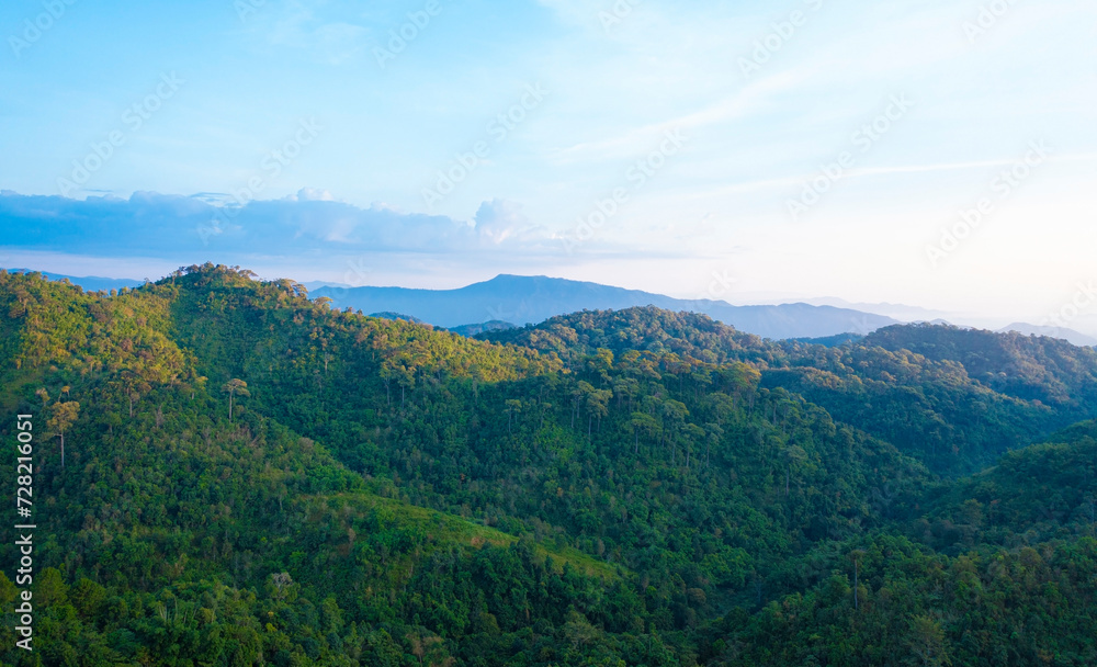 Panorama view with  wonderful springtime landscape in mountains. grassy field and rolling hills. rural scenery