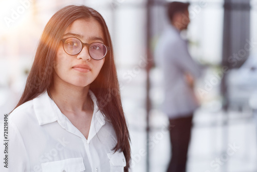 Young student or teacher looking at camera