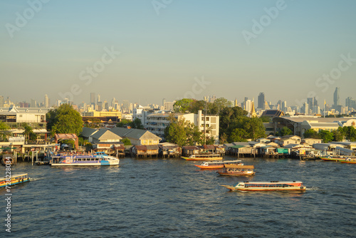 Aerial view of Bangkok Downtown Skyline with Chao Phraya River, Thailand. Financial district and business centers in smart urban city in Asia. Skyscraper and high-rise buildings.