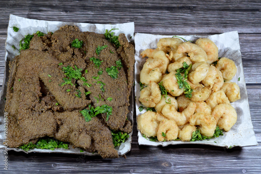 Traditional Arabic deep fried beef liver slices, beef liver covered with wheat bran, (Kebda Bel