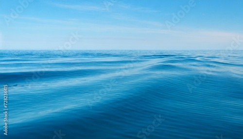 Waves of the open sea under the blue sky. horizon © two K