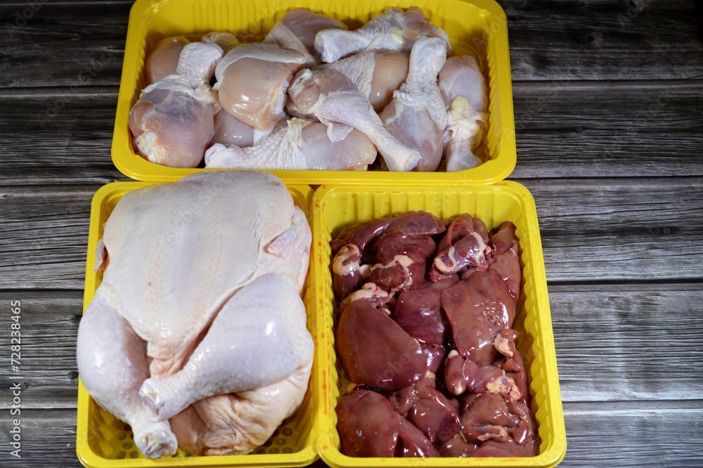 Fresh Raw chicken legs drumsticks hindquarter, raw full chicken with