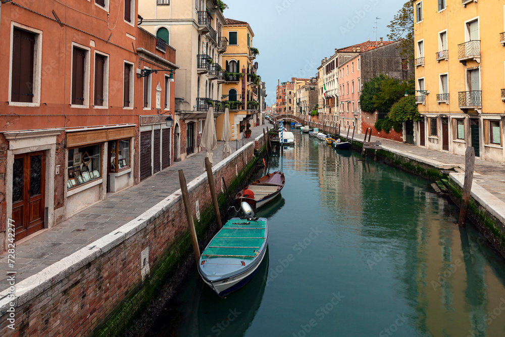 Classic view of Venice with canal and old buildings, Italy