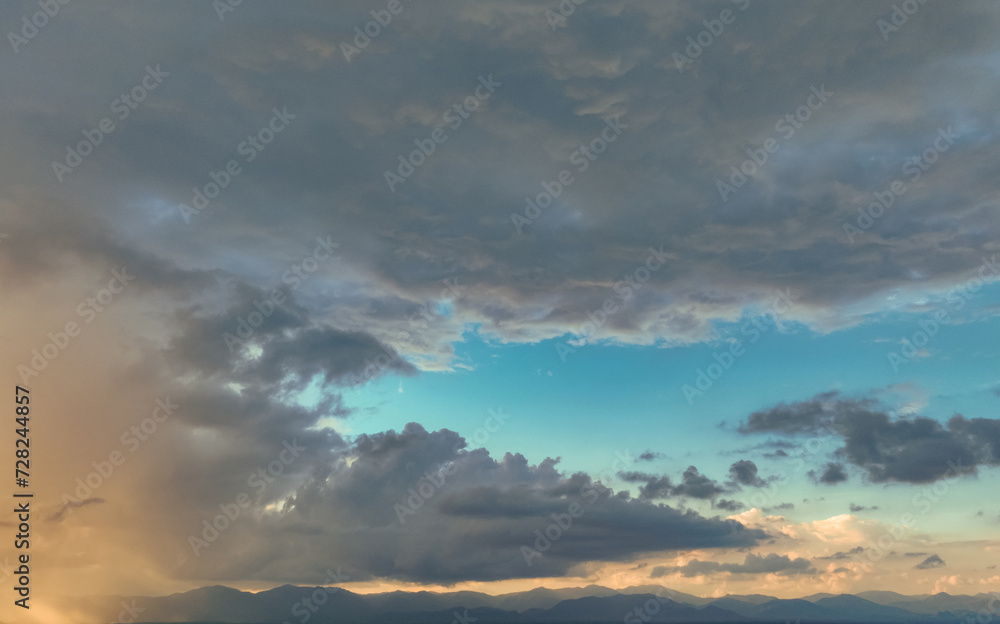 Beautiful blue sky and cumulus clouds abstract background. Cloudscape background. Blue sky and fluffy clouds. World Ozone Day. Ozone layer. Overcast clouds. Peaceful and tranquil. Dramatic sky.