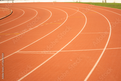 Red running track lines in the stadium.
