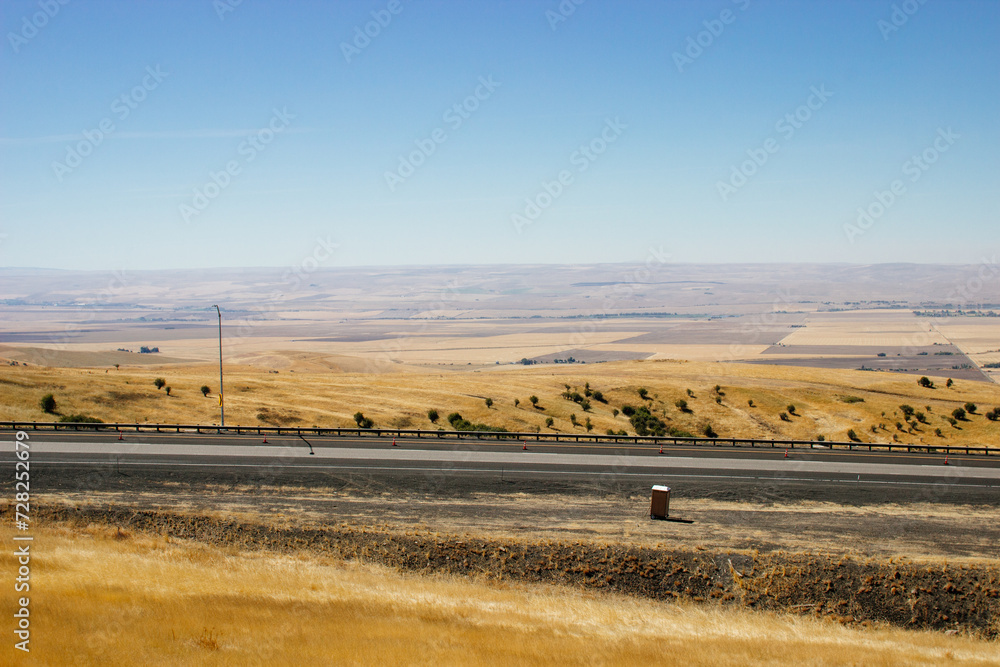 Beautiful summer landscape with a bird's eye view of the hills and mountains in Oregon, USA, on a sunny day. Beautiful summer landscape with a bird's eye view of the hills and mountains in Oregon, USA, on a sunny day.