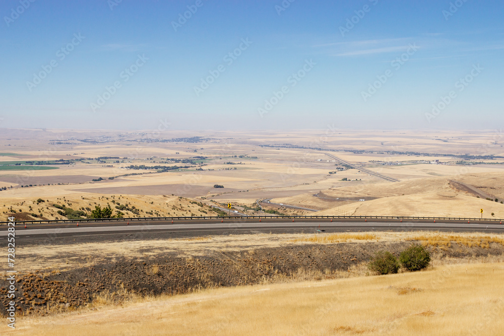 Beautiful summer landscape with a bird's eye view of the hills and mountains in Oregon, USA, on a sunny day.