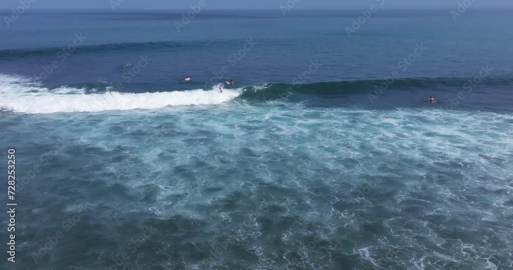 Surfing in Bingin Beach, Uluwatu Bali Island, Indonesia Surfing in Bingin Beach, Uluwatu Bali Island, Indonesia