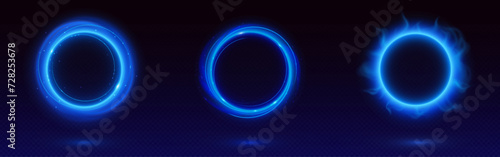 Blue circle frames set isolated on transparent background. Vector realistic illustration of round neon borders with haze and shimmering particles, sparkles, magic power effect, space portal design