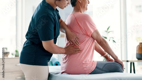 Physical therapy, back massage and chiropractor with senior woman in medical office at clinic. Rehabilitation, patient and physiotherapist helping elderly female person healing muscle pain of injury. photo