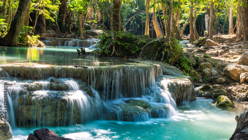 Beautiful deep forest Erawan waterfalls in Thailand photo