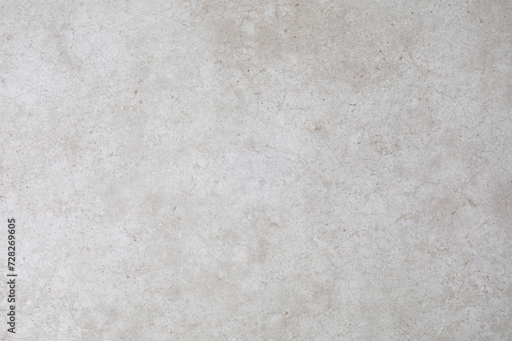 Fototapeta premium Textured pattern of a beige ceramic tile for a backdrop