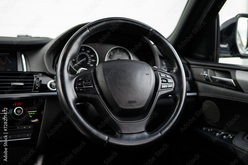 Modern car interior steering wheel controls