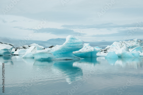 Jokulsarlon glacial lake with blue water and unique floating icebergs