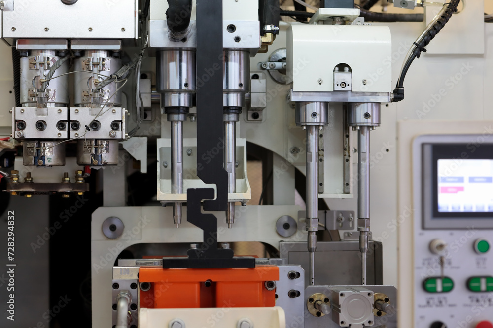 close up of plastic injection blow molding machine close up of plastic injection blow molding machine