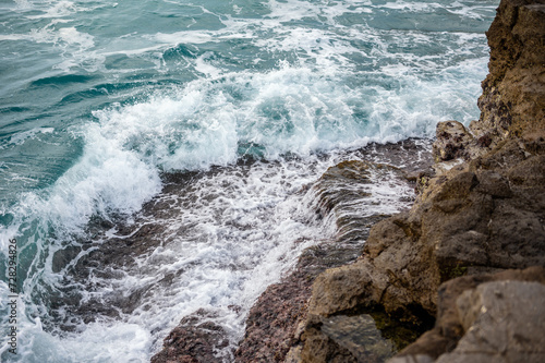 waves crashing on rocks