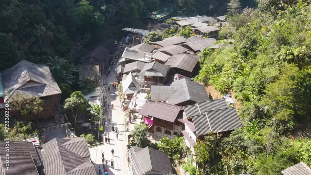 Aerial Flying Over Mae Kampong Village Rooftop Located At Chiang Mai Province. Push Forward, Tilt Down Towards Street Aerial Flying Over Mae Kampong Village Rooftop Located At Chiang Mai Province. Push Forward, Tilt Down Towards Street