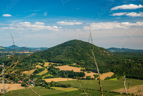 Vlhost, Bezdez and few other hills with rural landscape bellow from Ronov hill in Czech republic photo