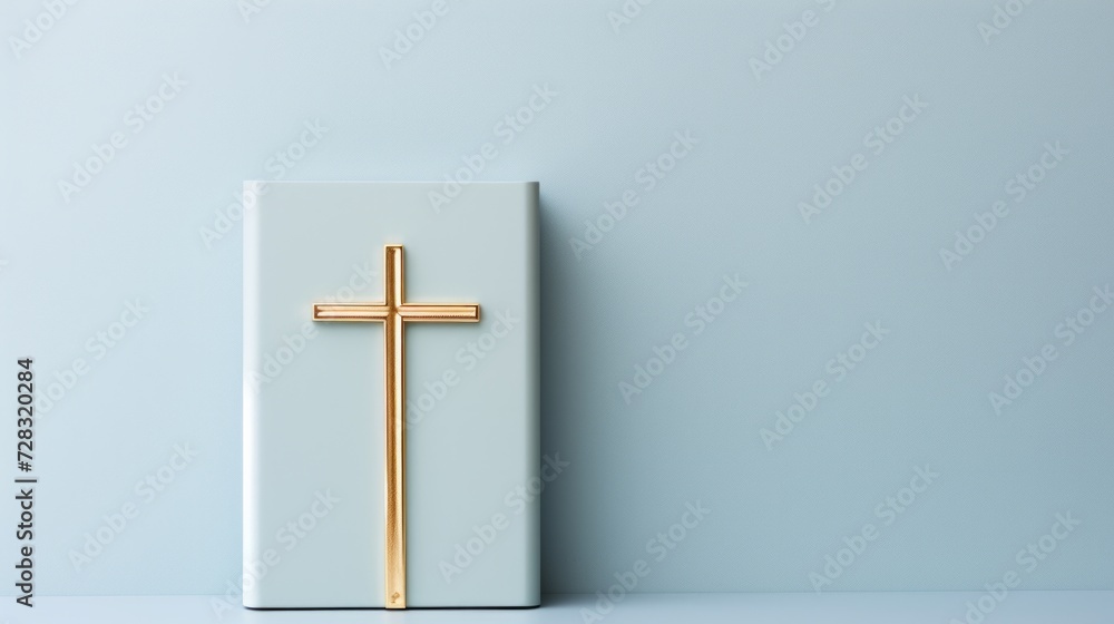 A clean, modern Easter card design showcasing a simple, gold foil cross on pale blue.