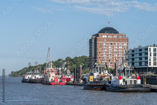 Germany, Hamburg, Tugboats moored in front of Augustinum photo