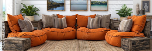 cozy living room setup with a modular orange sofa and rustic wooden tables, overlooking a serene water view through large windows