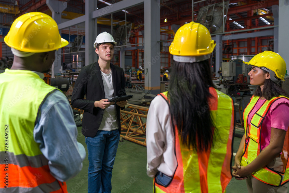 Warehouse safety meeting, people with hardhat. Industrial teamwork. Warehouse safety meeting, people with hardhat. Industrial teamwork.