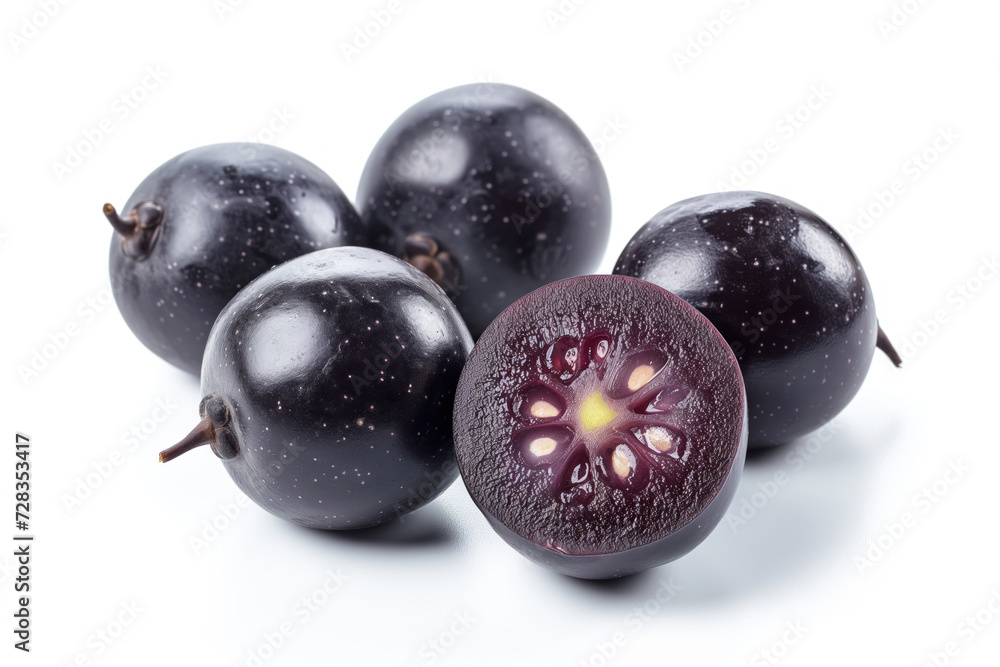 A fresh jabuticaba fruit, isolated on a white background. This Brazilian exotic fruit is ripe, black, and round. It’s a healthy, sweet, and delicious tropical food. A fresh jabuticaba fruit, isolated on a white background. This Brazilian exotic fruit is ripe, black, and round. It’s a healthy, sweet, and delicious tropical food.