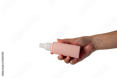 Cosmetic pink bottle. Womens cosmetic accessory and hand for makeup on transparent background.