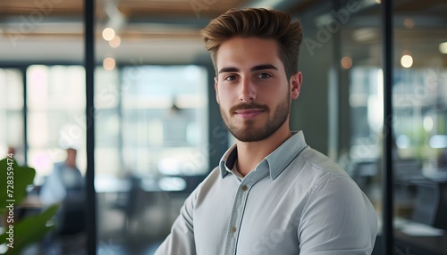 young businessman, corporate employee or team coach at professional business training event. Serious unsmiling handsome young man in shirt standing in office and looking at camera. generative AI photo
