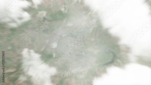 Earth zoom in from space to Alchevsk, Ukraine. Followed by zoom out through clouds and atmosphere into space. Satellite view. Travel intro. Images from NASA photo