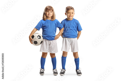 Boy and girl posing in blue and white football kits © Ljupco Smokovski