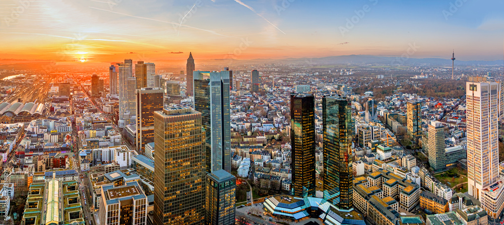 Fototapeta premium aerial view to panorama of Frankfurt in sunset