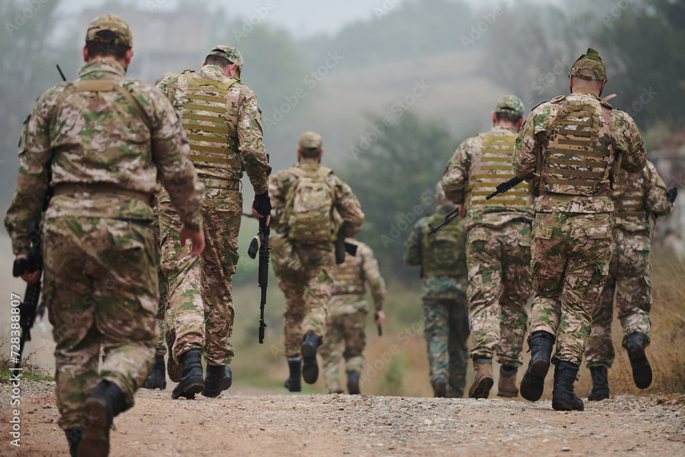 A disciplined and specialized military unit, donned in camouflage, strategically patrolling and maintaining control in a high-stakes environment, showcasing their precision, unity, and readiness for A disciplined and specialized military unit, donned in camouflage, strategically patrolling and maintaining control in a high-stakes environment, showcasing their precision, unity, and readiness for