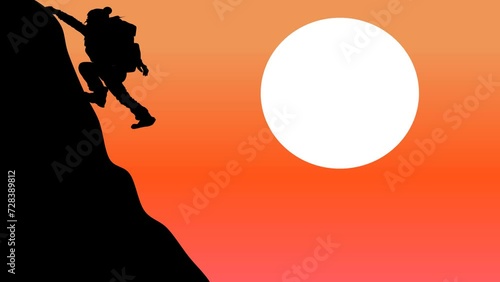 夕日を背に登山している女性の動画
