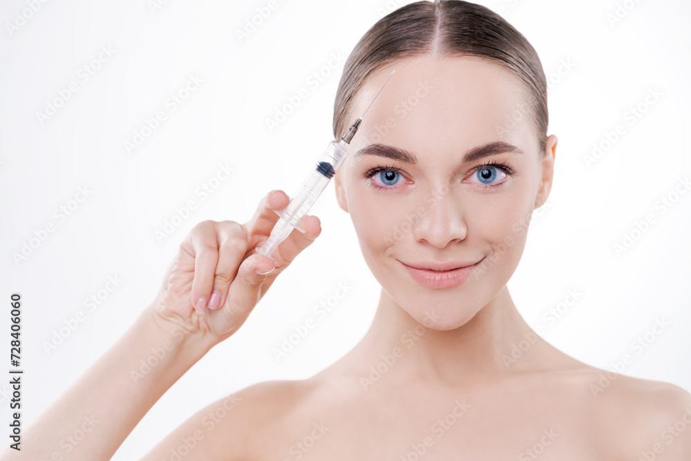Skincare, woman and face injection for plastic surgery in studio isolated on white background. Portrait, syringe and cosmetics female model with collagen filler, dermatology or beauty mockup space.