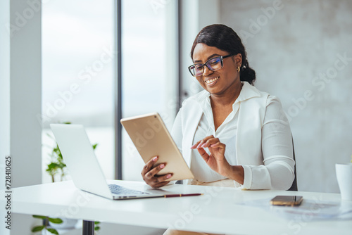 Thinking about how to take the business to technological heights. Cropped shot of an attractive young businesswoman working in her office. Young businesswoman using digital tablet