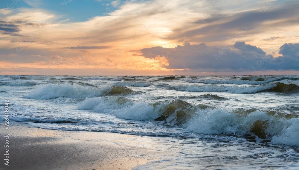 sunset on baltic sea white pastel color sky and rough sea