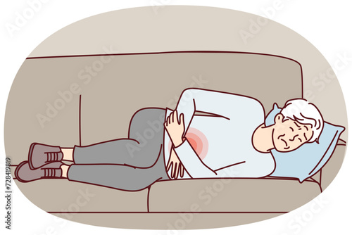 Elderly human is experiencing pain in stomachs and weakness after food poisoning lies on couch with sad face. Gray-haired man holding on to belly suffers from digestive disorders. Flat vector design