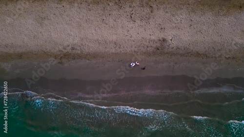 Aerial View Of The Famous Resort Rimini. Drone Shot. Summer background. Sea coast in August, Adriatic sea. Italy, Rimini, Emilia-Romagna 15.08.2023. High quality 4k Drone footage photo