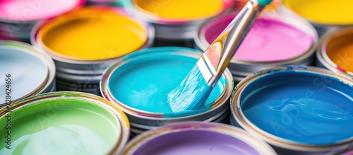 paint colorful cans with a brush on top